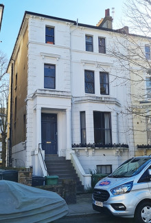 Substantial white stucco period property on Priory Road, South Hampstead